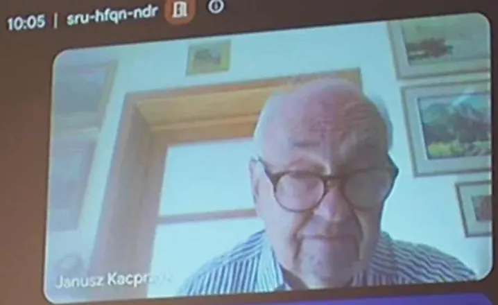Acad. Janusz Kacprzyk on the hall screen during his on-line invited talk
